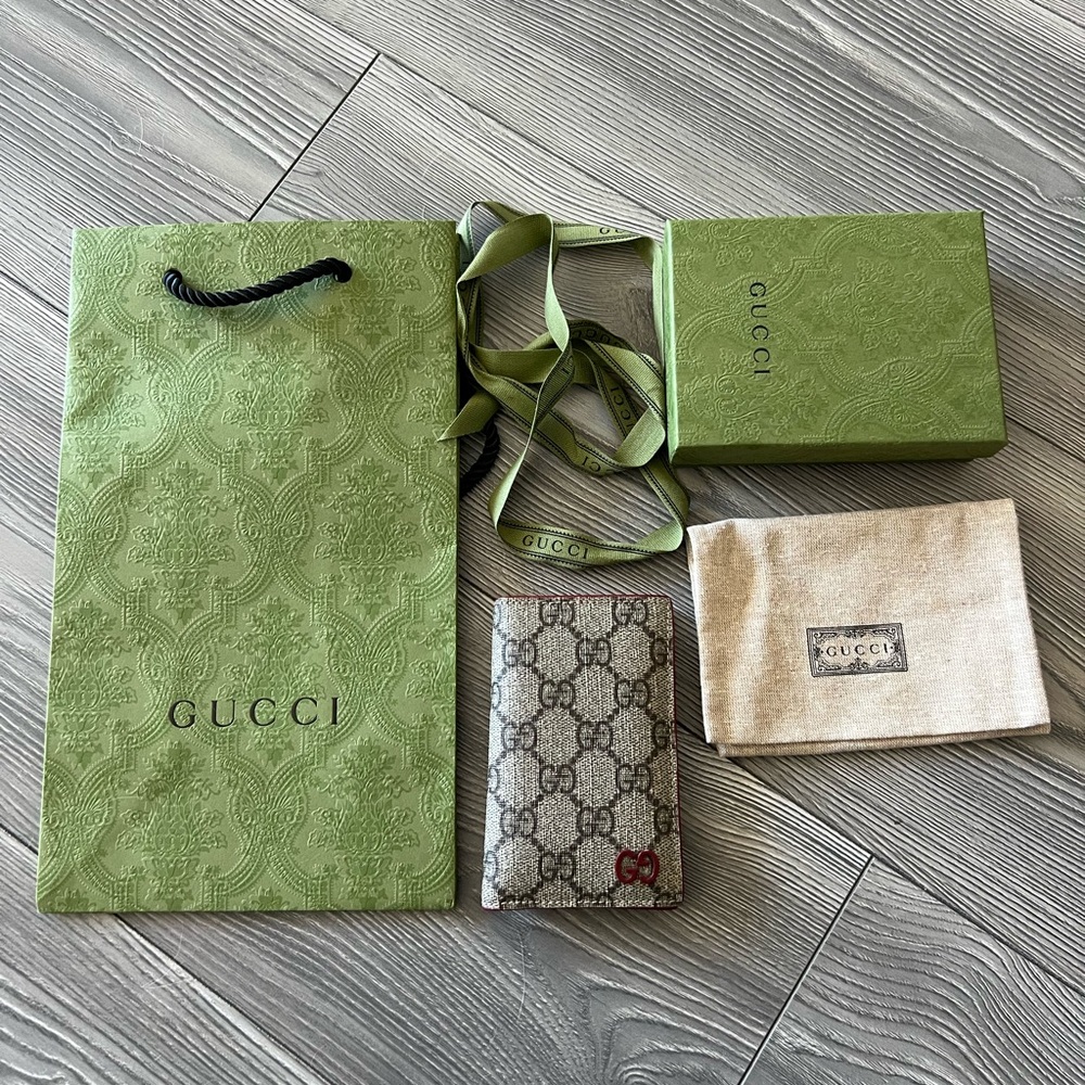 Authentic Gucci GG emblem bi-fold card case